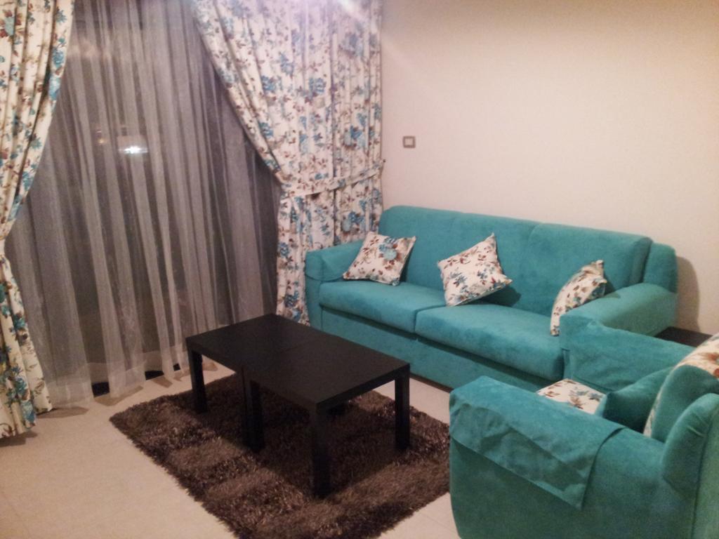 Cozy Dair Ghbar Apartment Amman Buitenkant foto